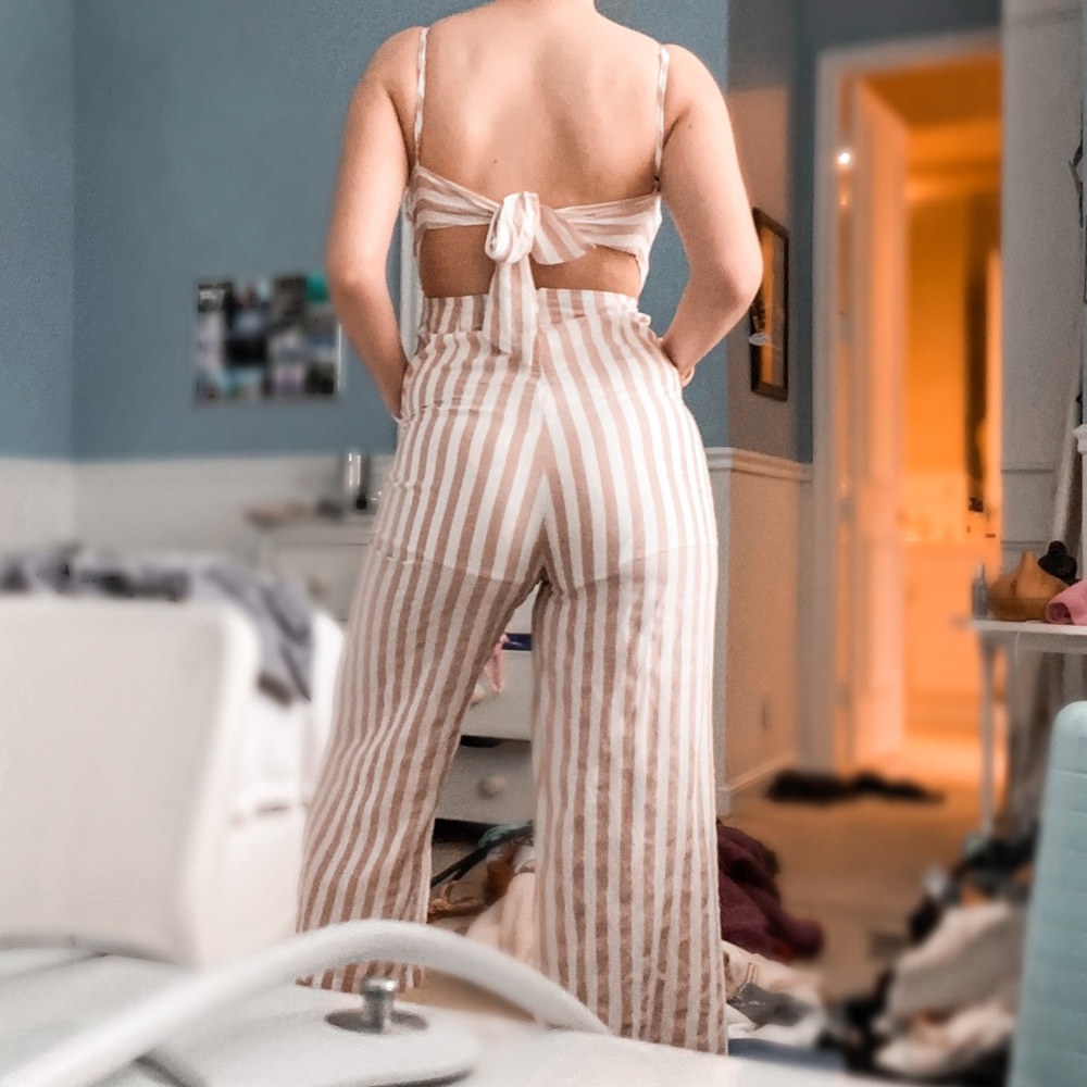 Super cute pink and white jumpsuit with pretty tie